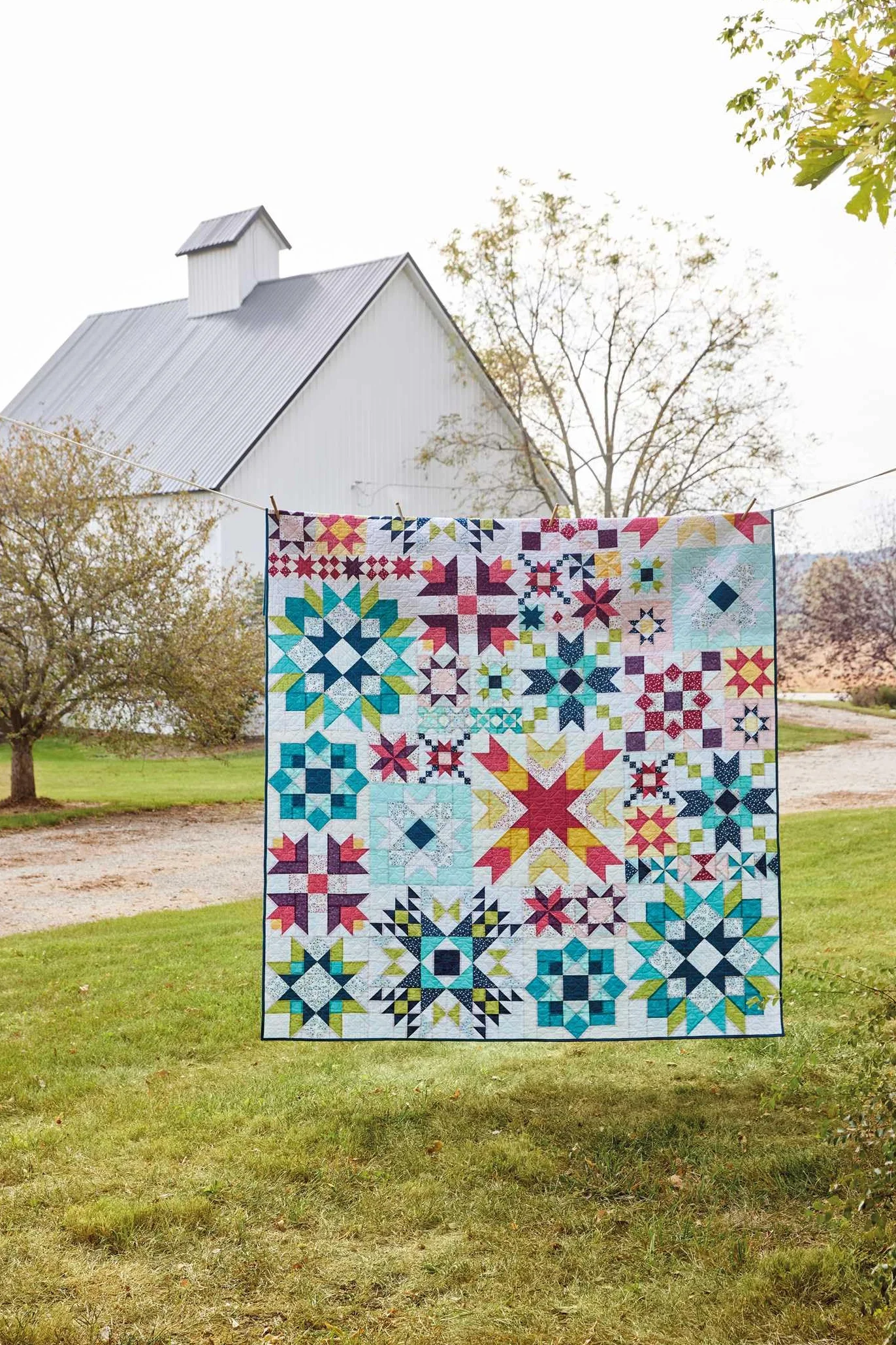 Barn Star Sampler: 20 Starry Blocks & 7 Spectacular Quilts