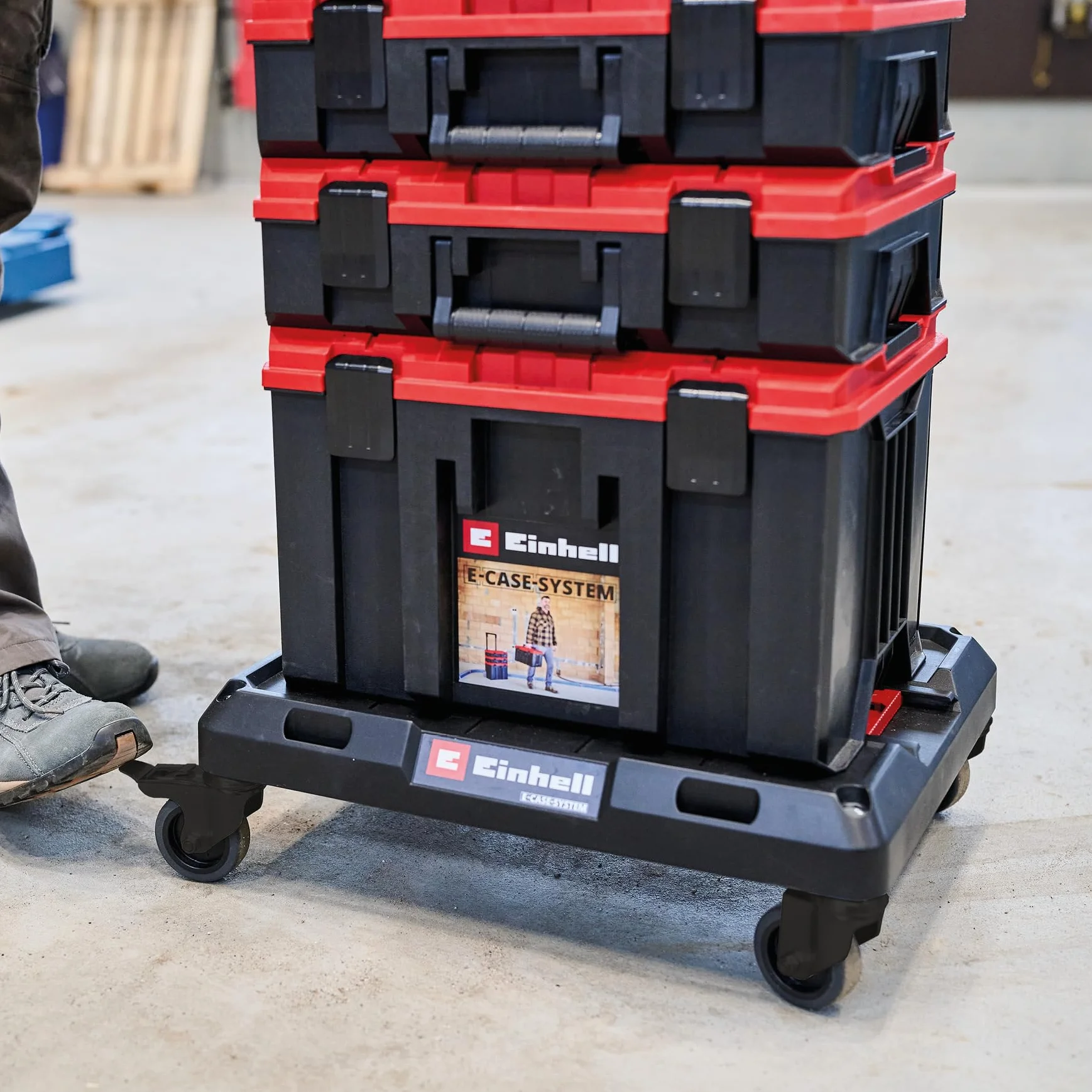 Oryginalna deska na kółkach Einhell E-Case (maks. 120 kg, blokowane kółka skrętne, możliwość łączenia z systemem Einhell E-Case, transport walizek i skrzyń, z mocowaniem pasów mocujących)